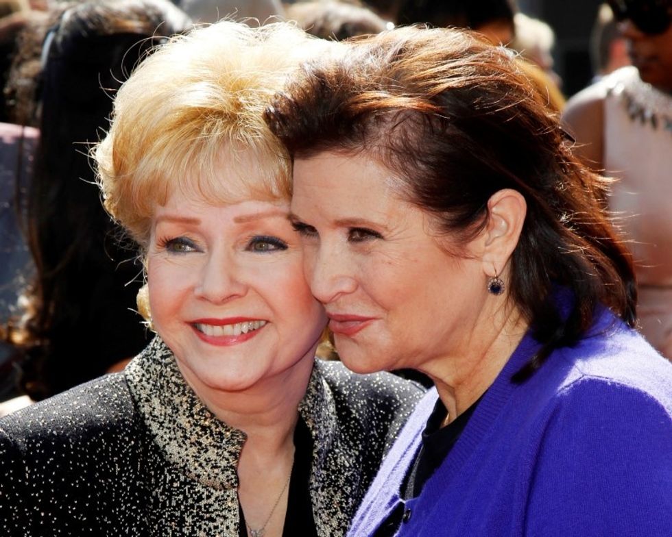 Actress Debbie Reynolds Dies Of Stroke, One Day After Daughter