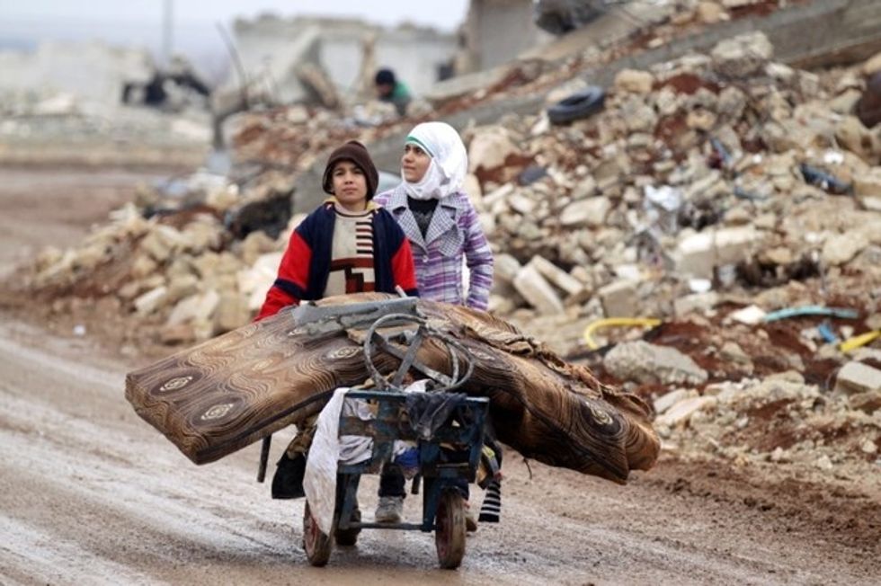 Thousands Return To The Freezing Ruins Of Aleppo