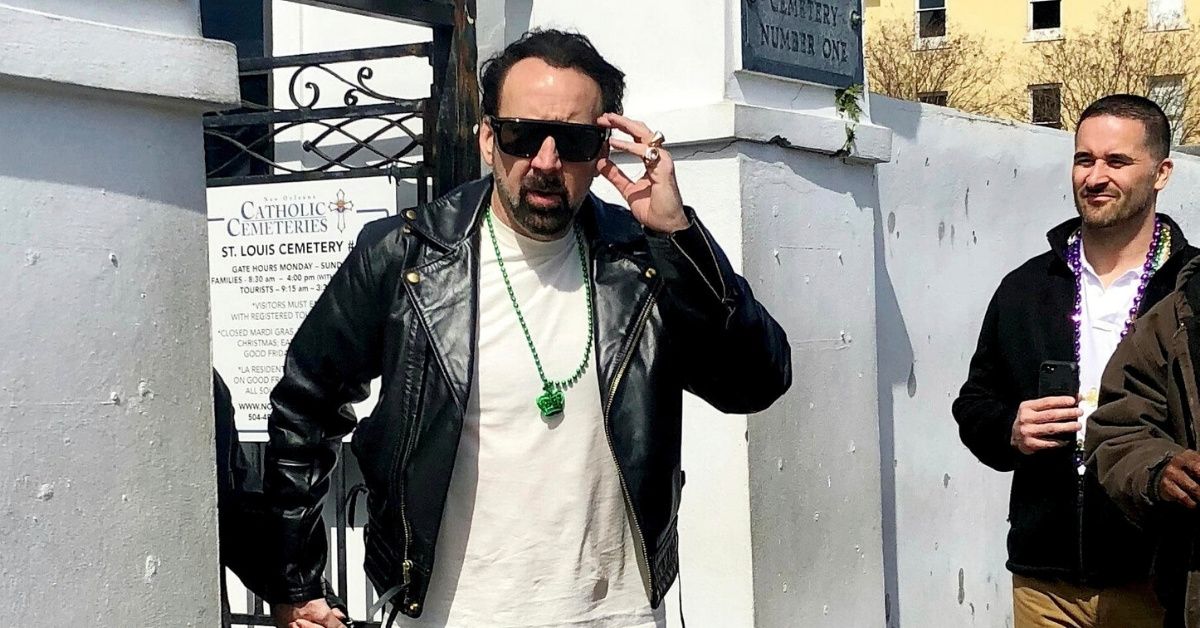 Nicolas Cage And A Mystery Woman Dressed In Matching Leather Outfits Just Casually Swung By The Cemetery To Check Out His Massive Tomb