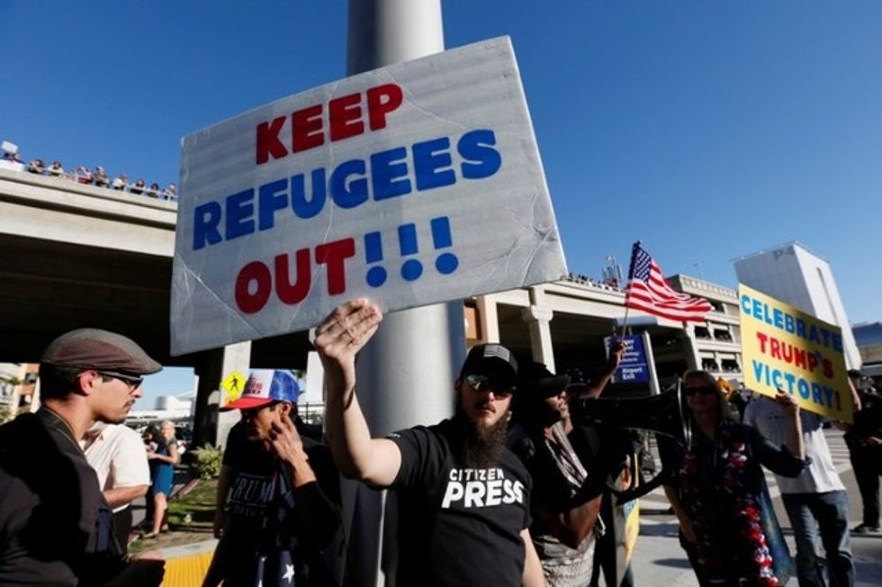 America Divided: Heartland Voters Shrug Off Global Uproar Over Immigration Ban