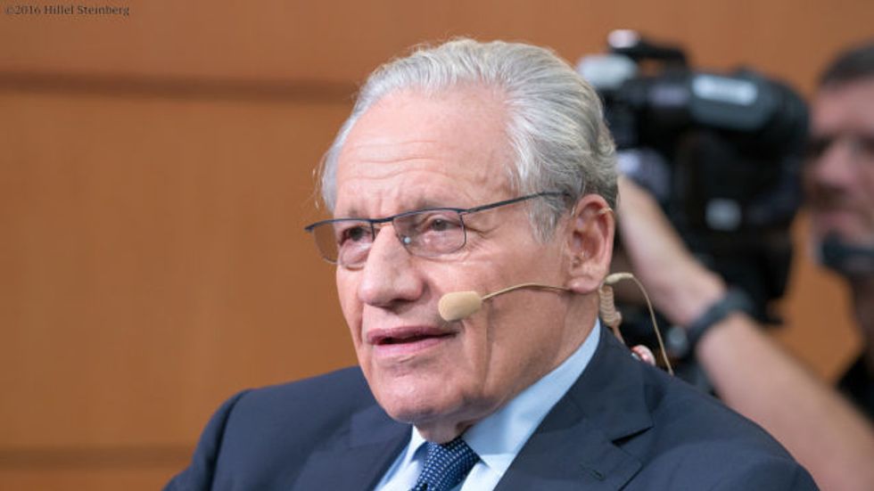 Woodward Book Says CIA Chief Confirmed Steele Dossier
