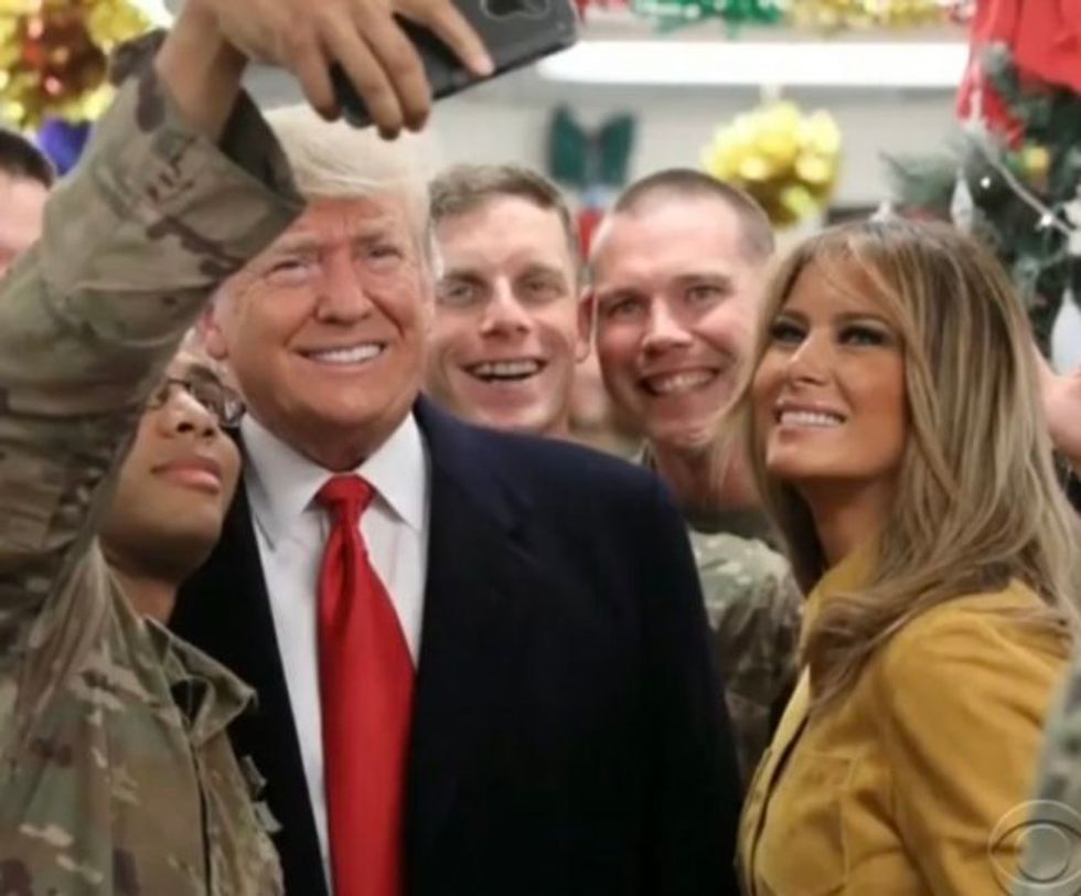 Visiting Troops In Iraq, Trump Brings Partisan Speech And MAGA Caps