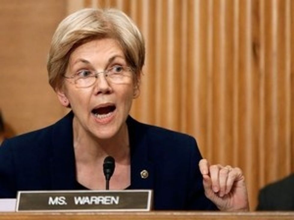Warren Openly Challenges Roberts Over Legitimacy Of ’Sham Trial’