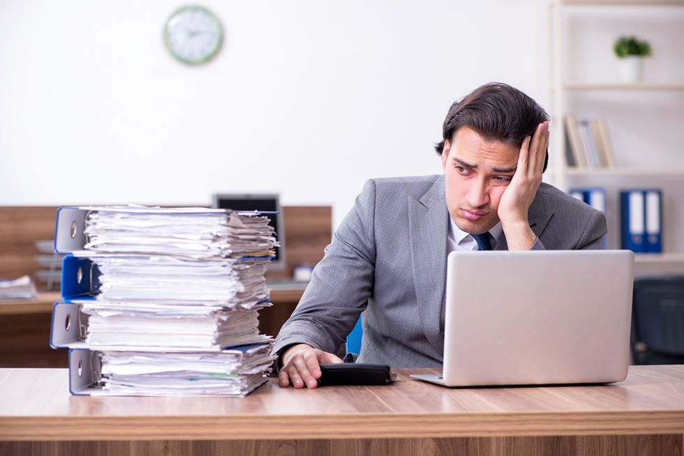 Professional man is overworked and wants a better work-life balance