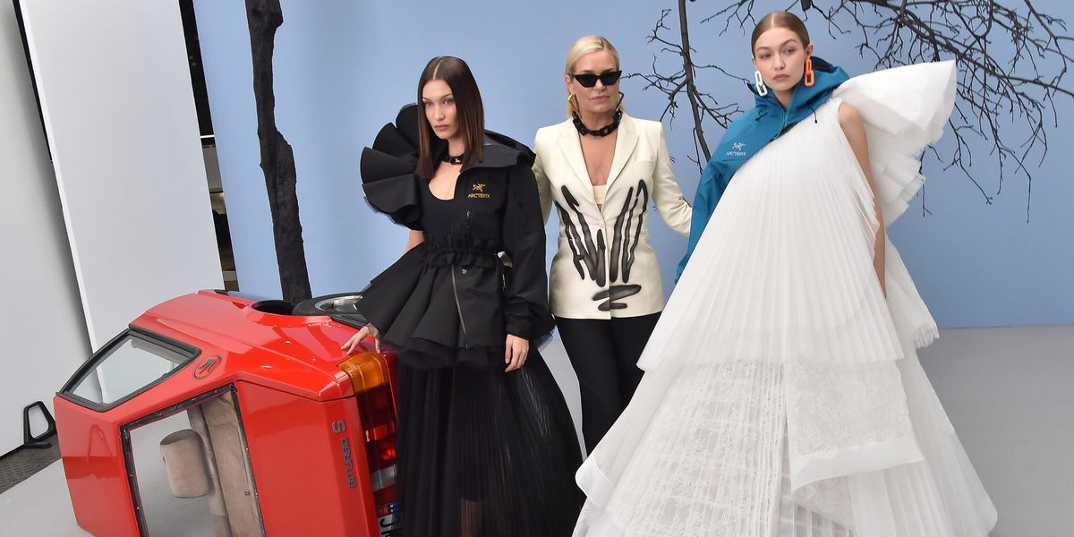 Designer Virgil Abloh and Gigi Hadid walk the runway during the