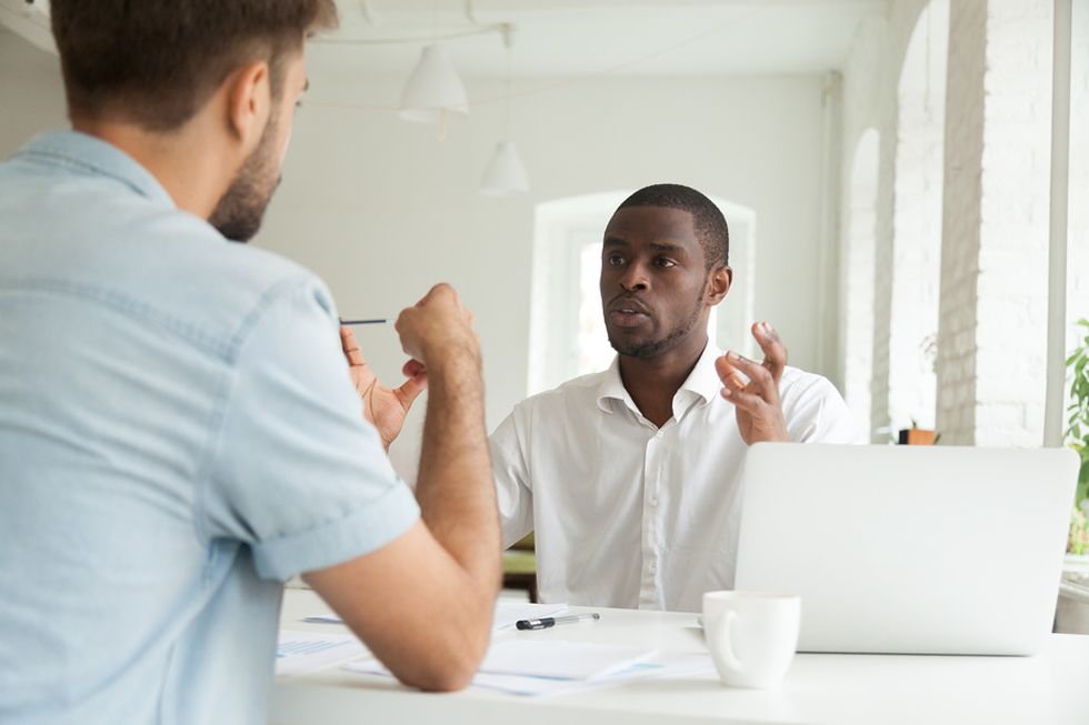 Professional man deals with a difficult co-worker