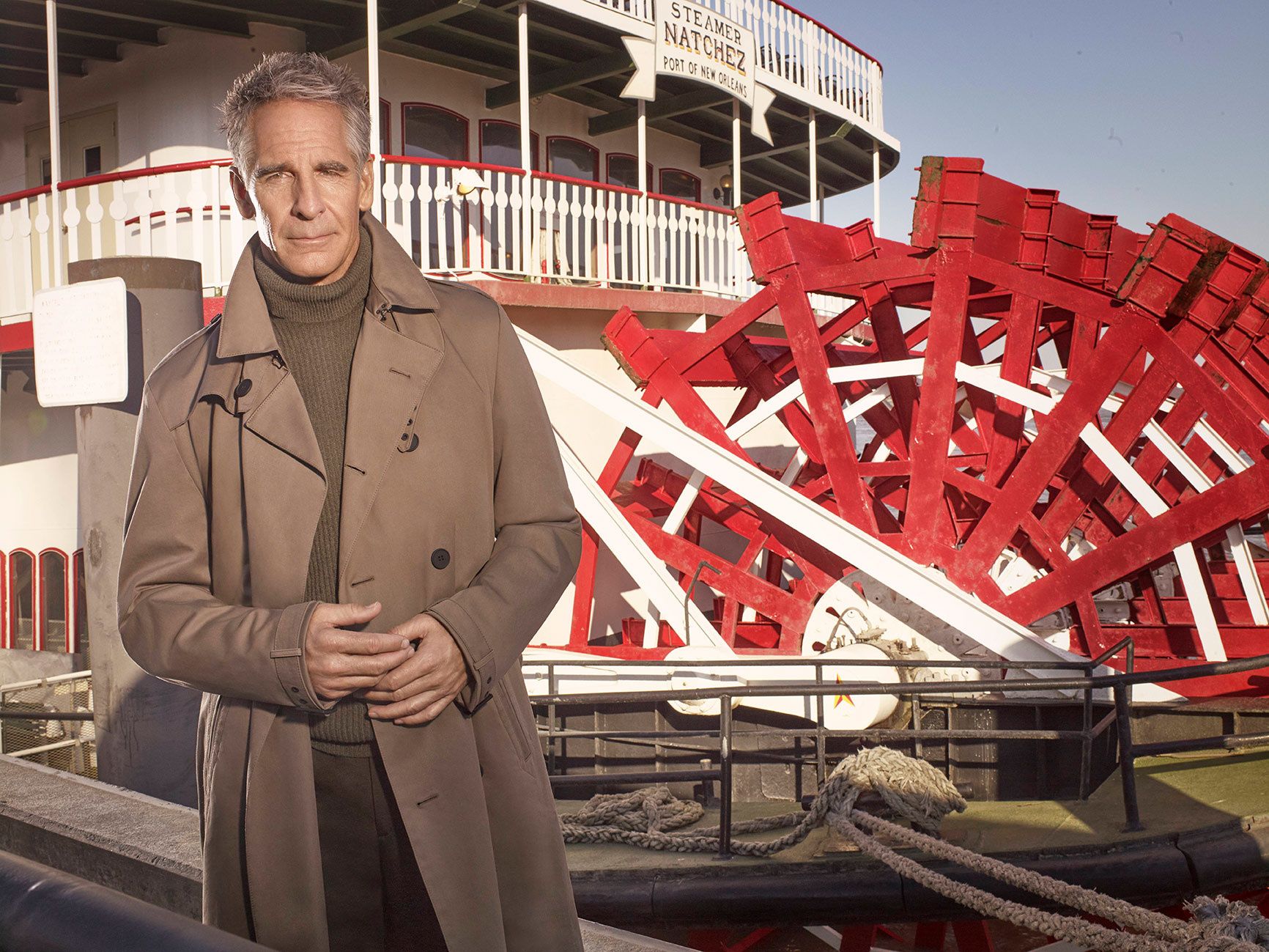Scott Bakula in front a New Orleans paddleboat.