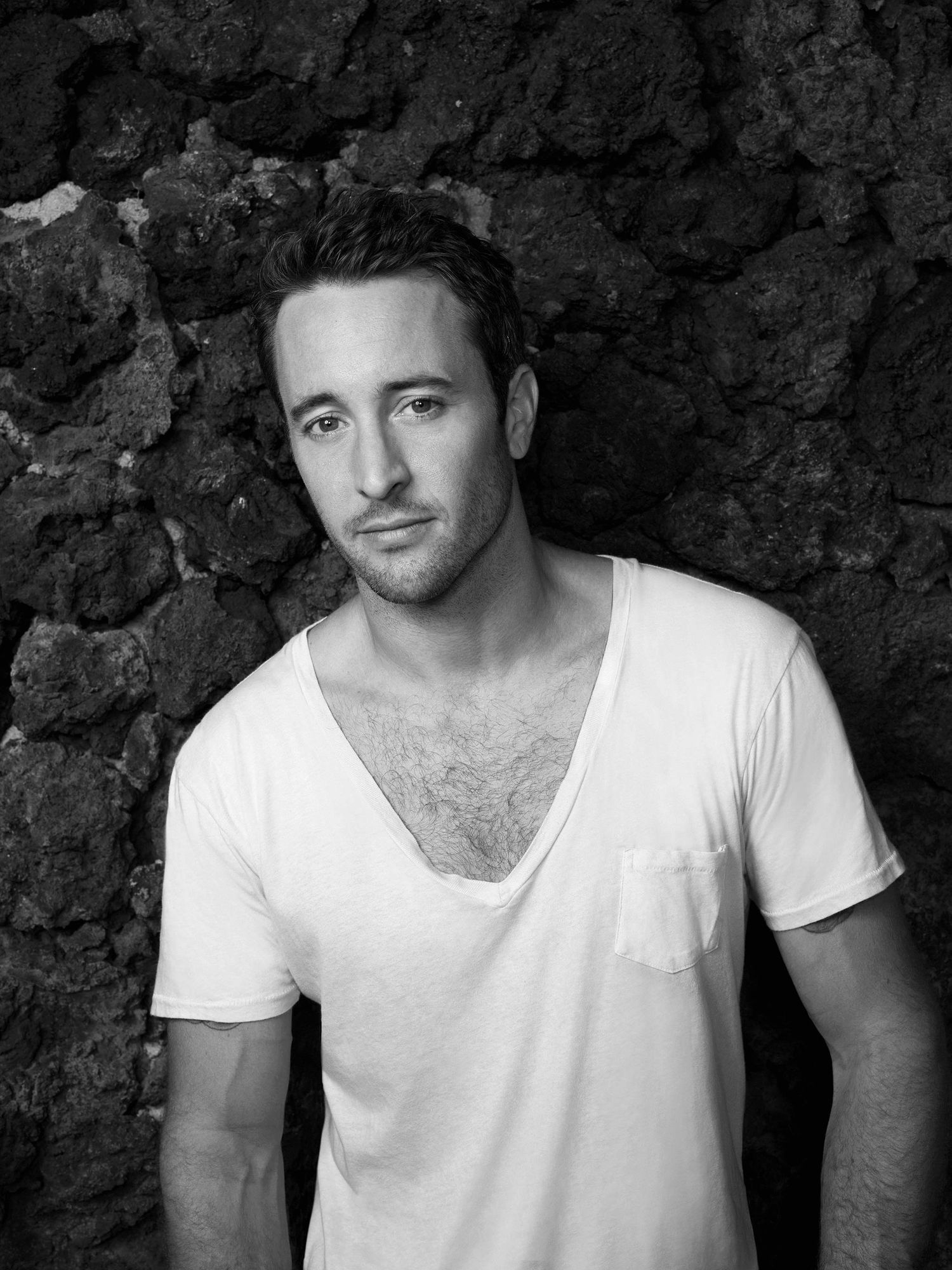 Black and white portrait of Alex OLoughlin.
