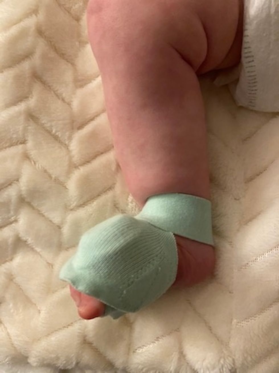 owlet sock on a baby's foot