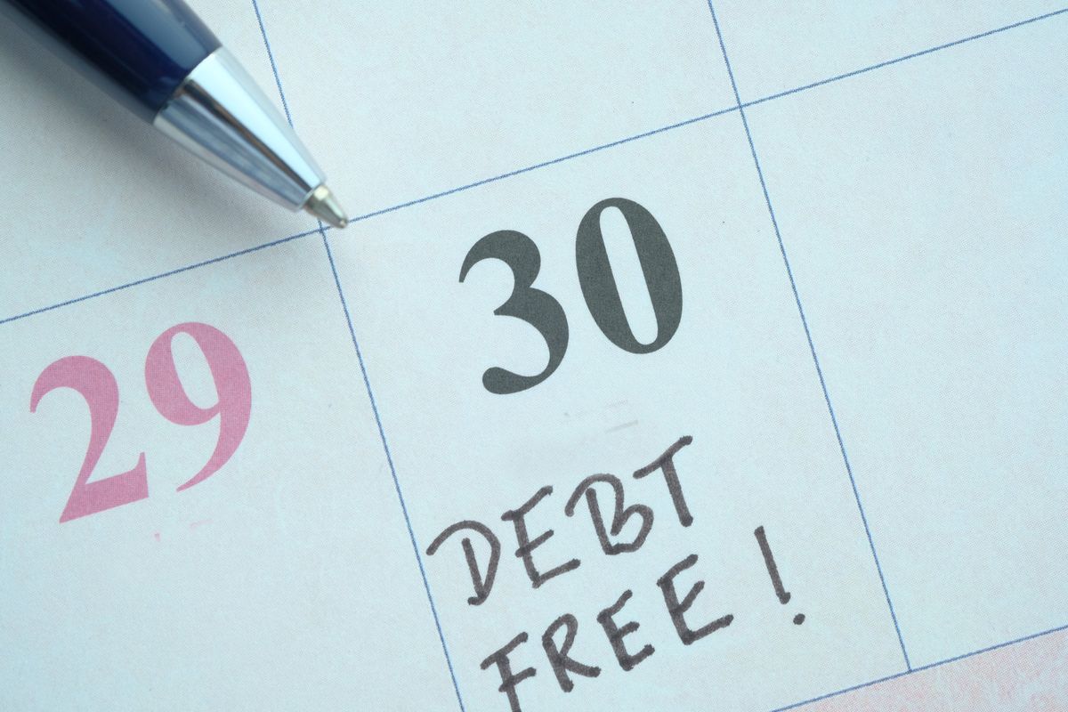 30th date on calendar saying "debt free!"
