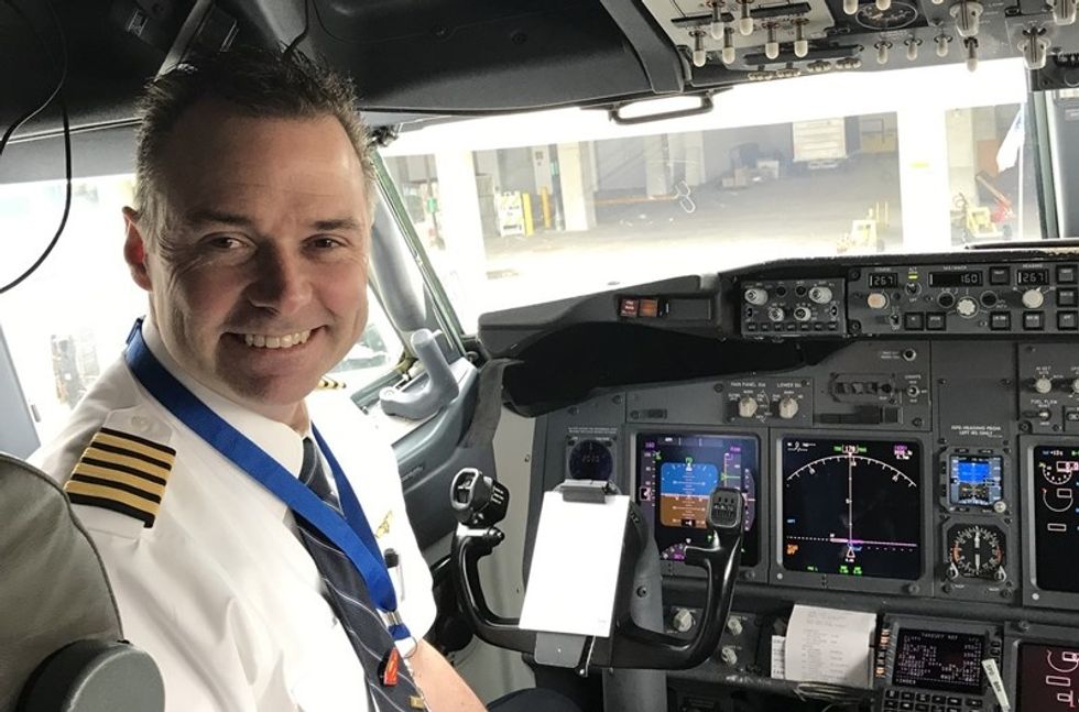 Captain David Whitson in the cockpit of a plane