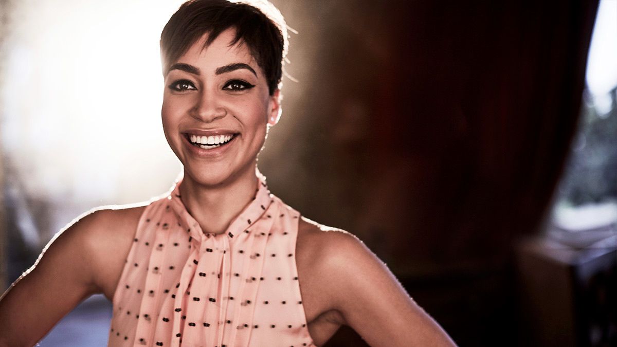 Actress Cush Jumbo backlit by sunlight.