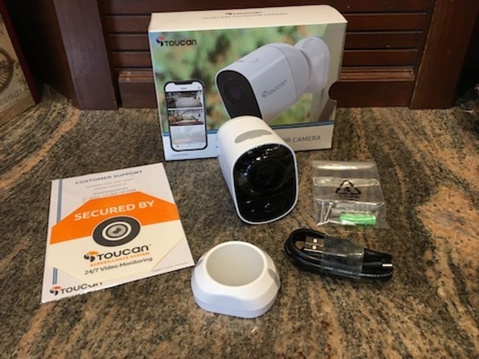 Photo of Toucan Outdoor Camera unboxed on a counter