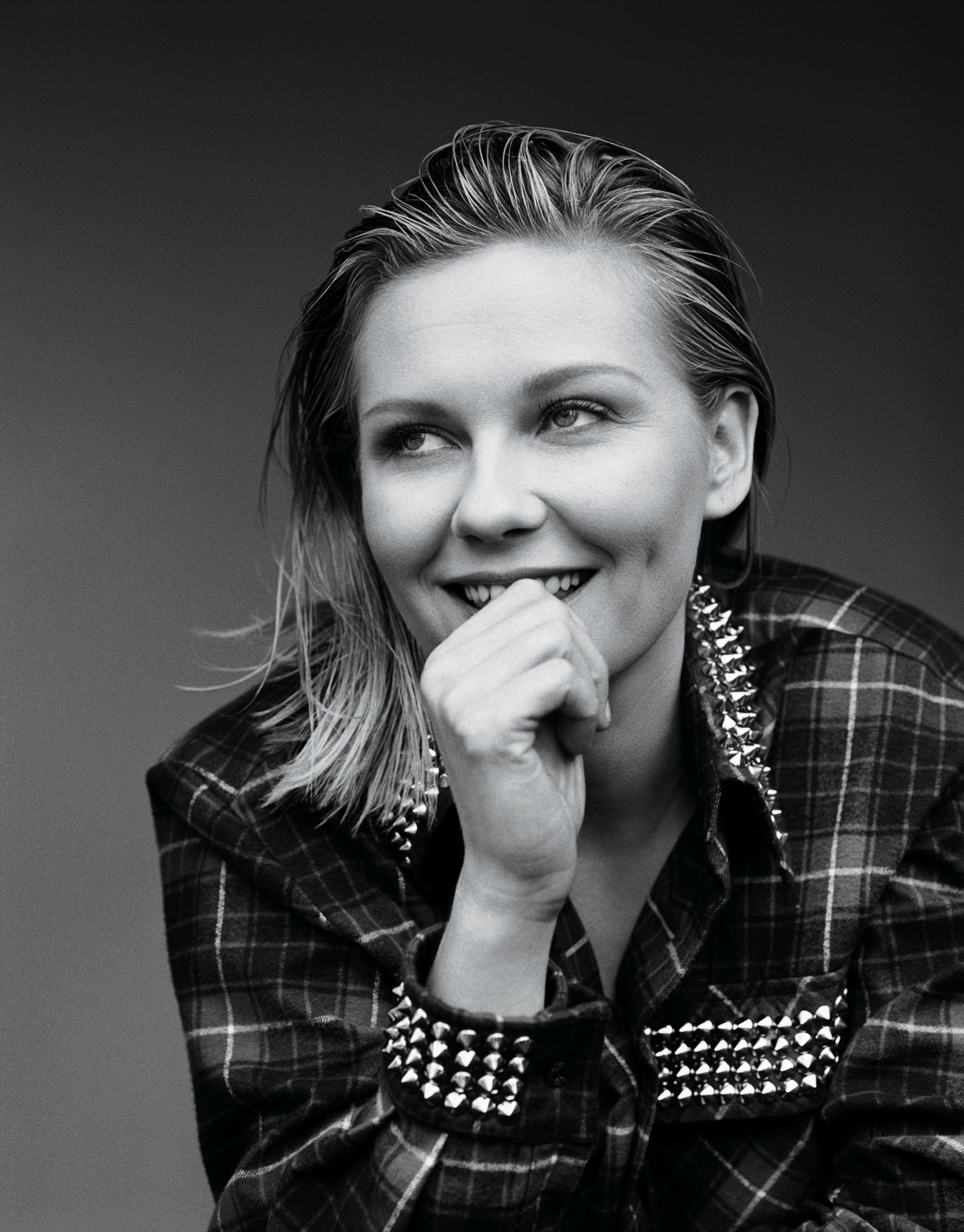 Black and white portrait of Kirsten Dunst.