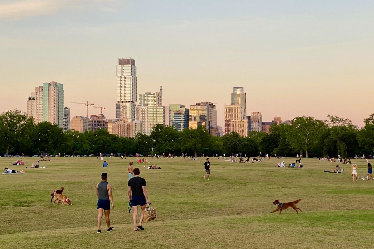 Zilker Park sunset skyline dogs social distancing