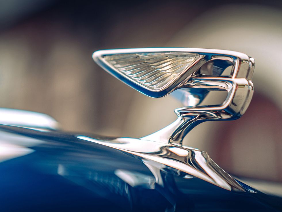 Flying B Spur mascot hood ornament