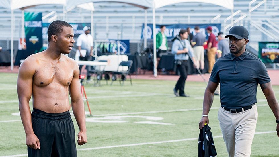 Daniel Ezra of talks to Taye Diggs in a scene from All American.