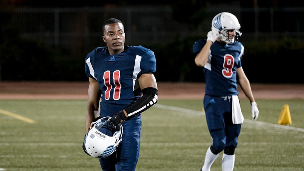 Daniel Ezra wears his on-field football gear in a scene from All American