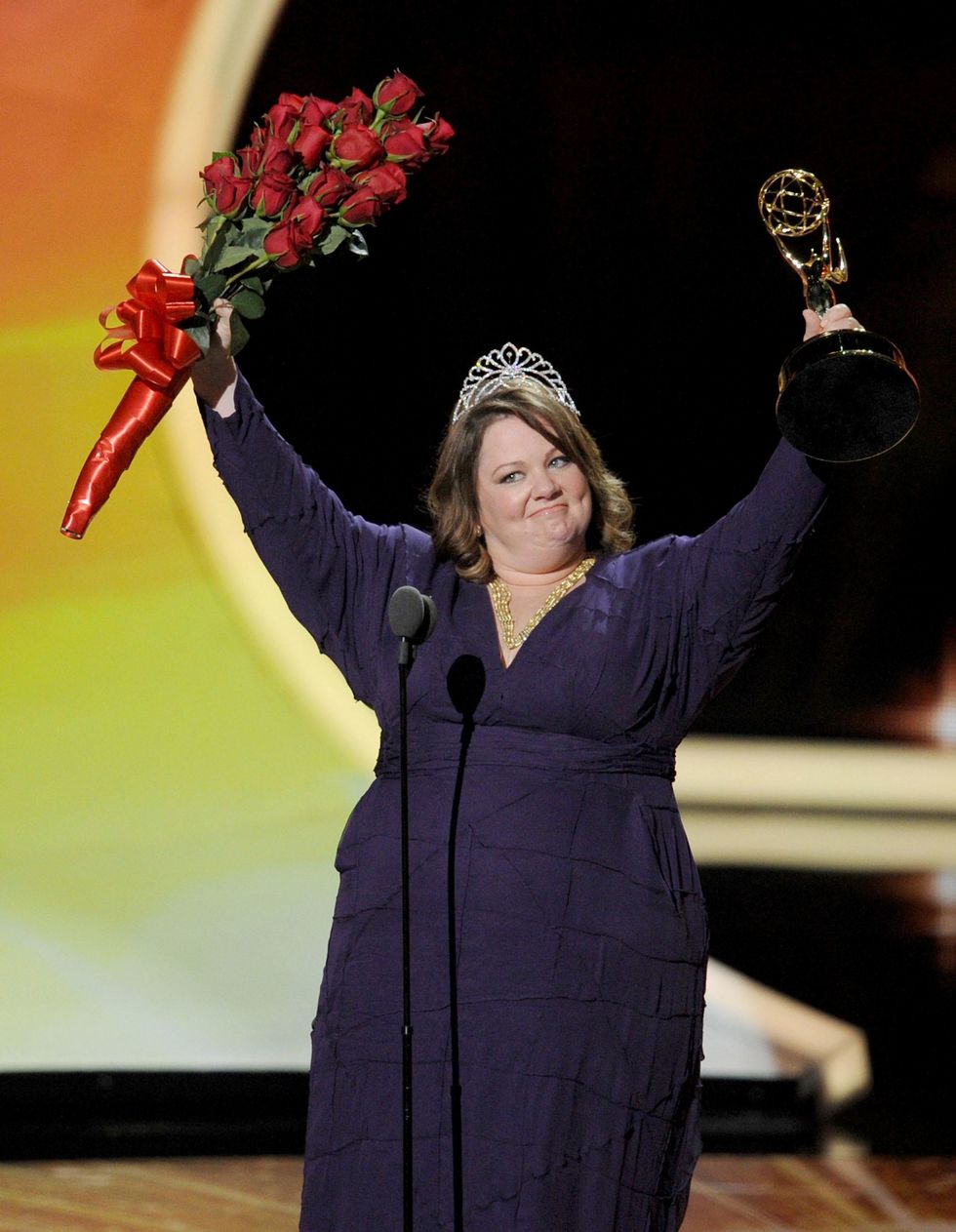 Melissa McCarthy onstage accepting Emmy award for Mike & Molly.
