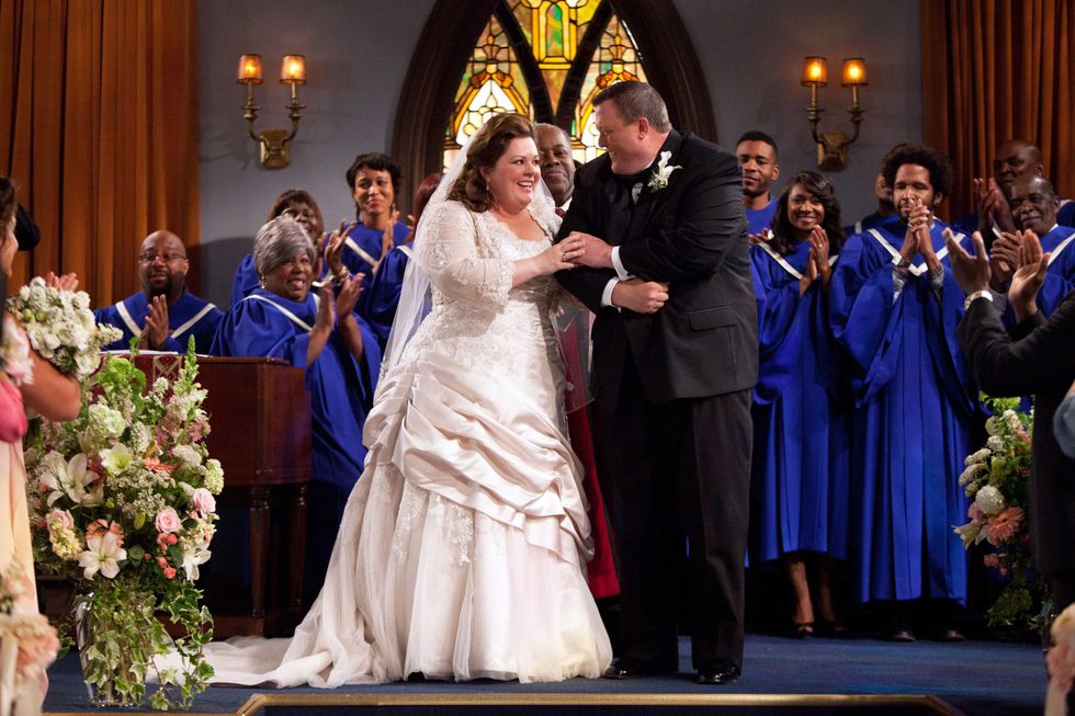 Billy Gardell and Melissa McCarthy dressed as bride and groom.