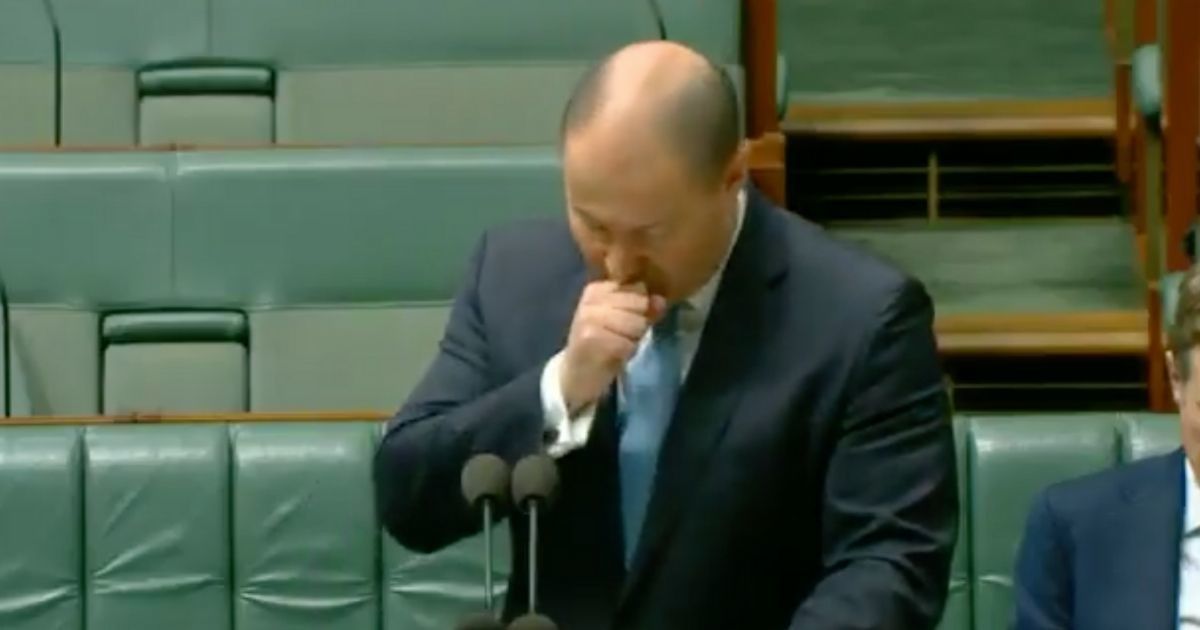 Politician's Coughing Fit During Speech Gets So Bad That He's Now Self-Isolating While Waiting For Test Results