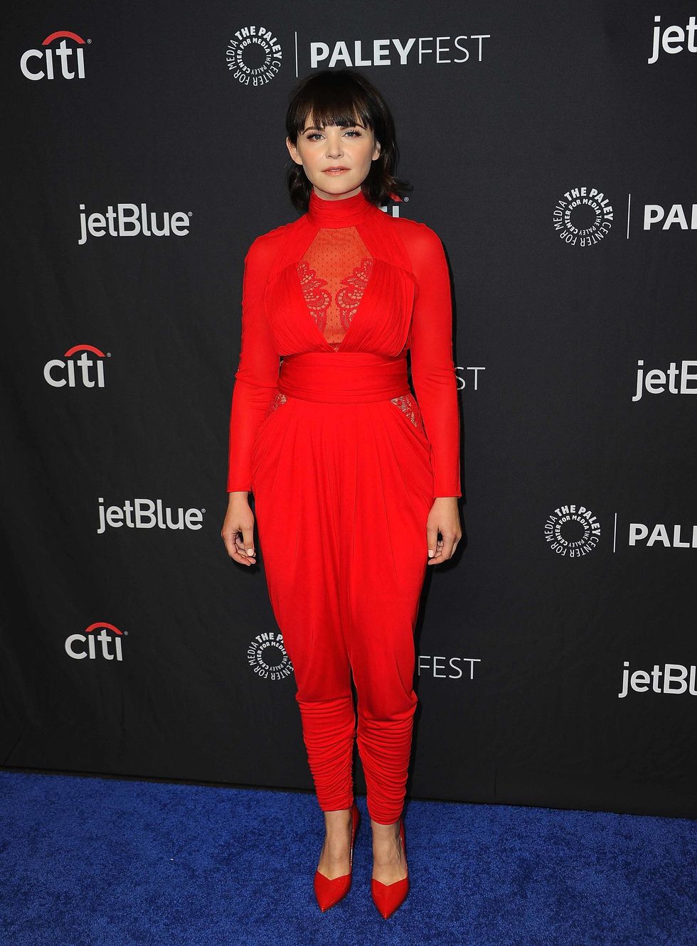 Ginnifer Goodwin in a red pant jumpsuit.