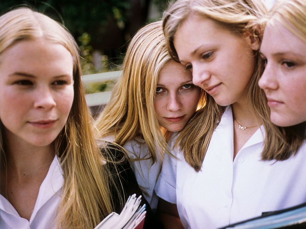 Still image of a teenage Kirsten Dunst and castmates from the movie The Virgin Suicides.
