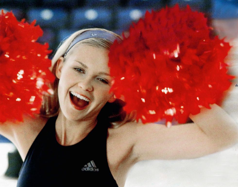 Kirsten Dunst in her cheerleader clothing from the movie Bring It On.