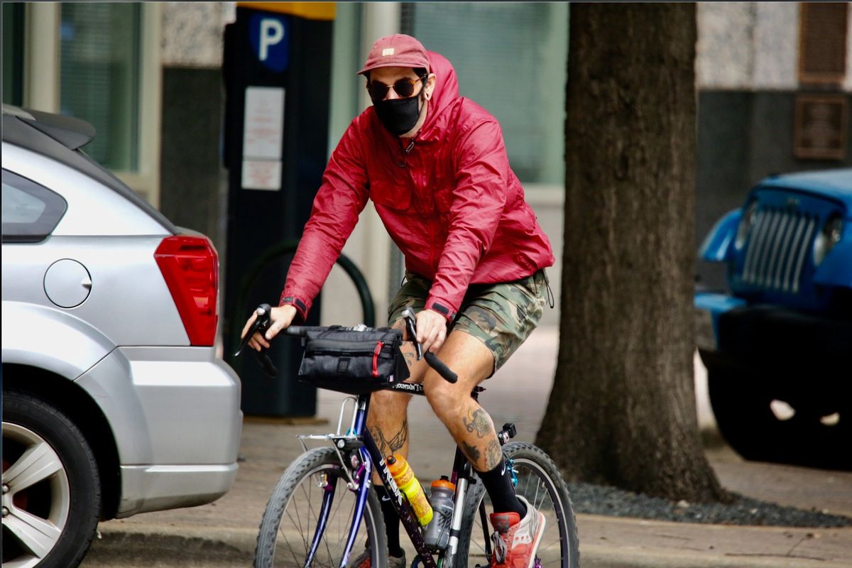 masks bike people Austin covid