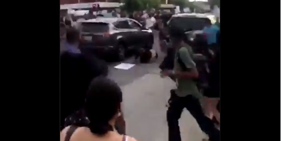 Terrifying footage shows car plowing through protest crowds in