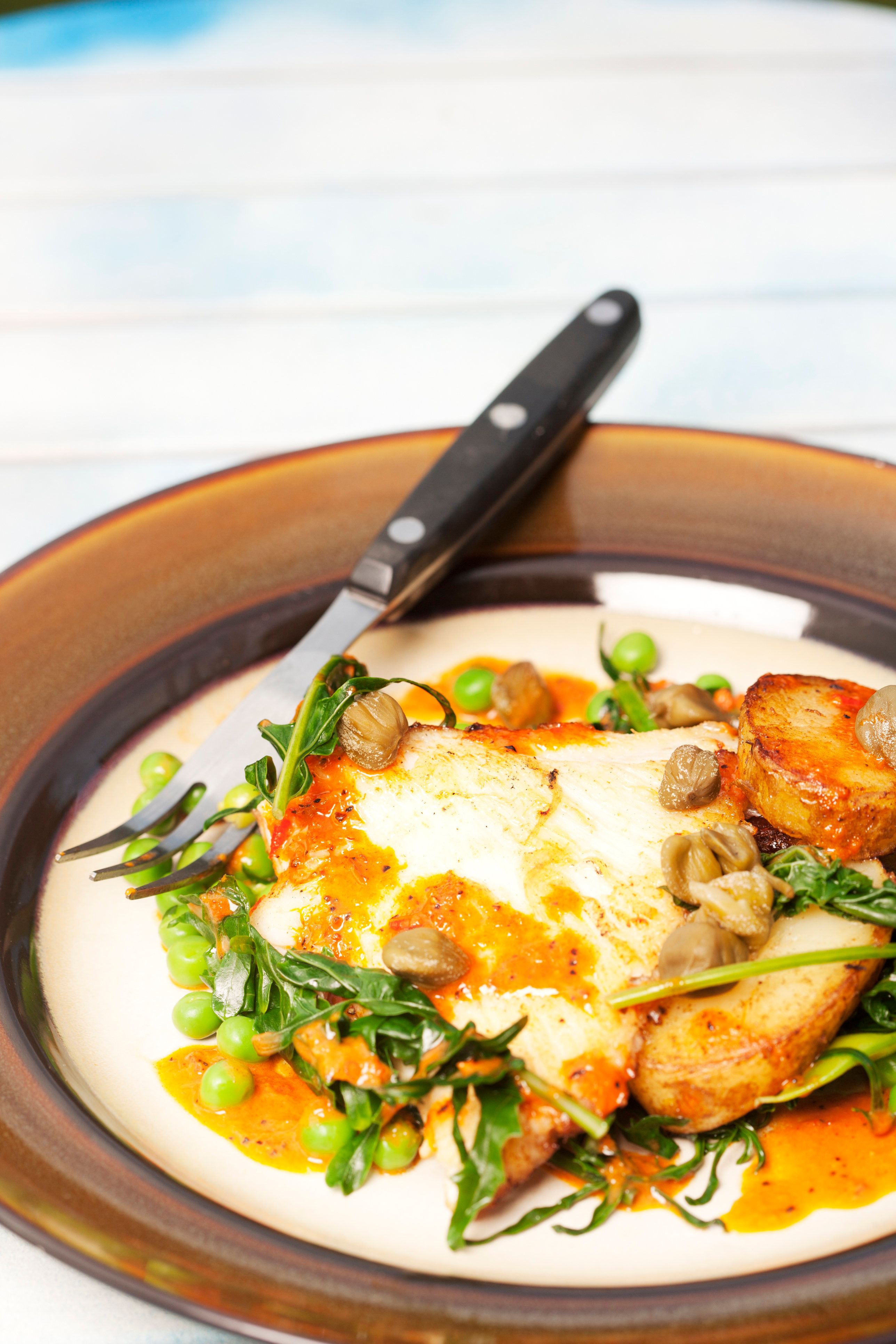 Cuciniamo insieme: ali di razza al burro nero