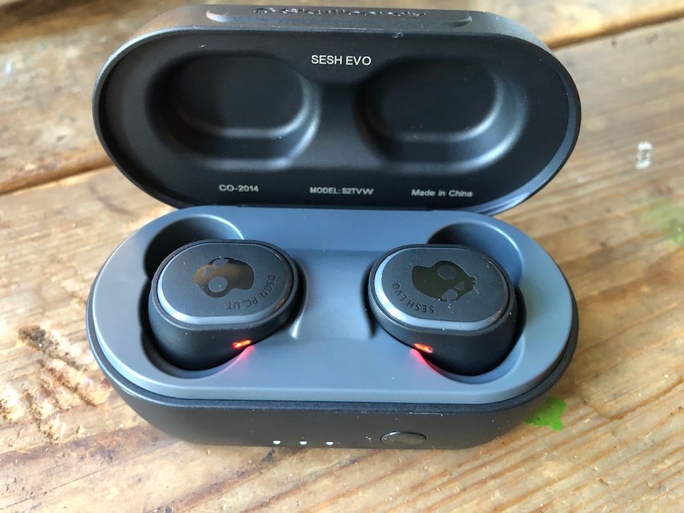 a phoo of Skullcandy Sesh Evo earbuds in their wireless charging case