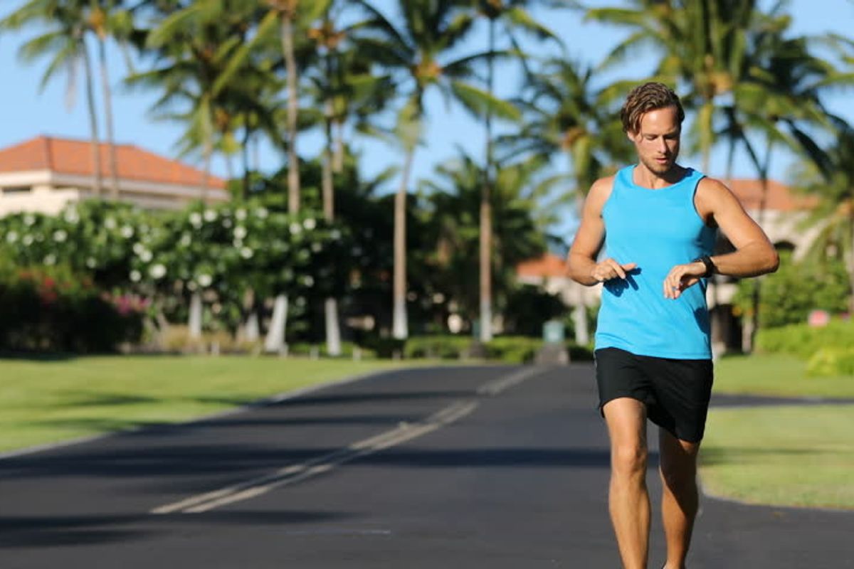 Runner looking at his watch