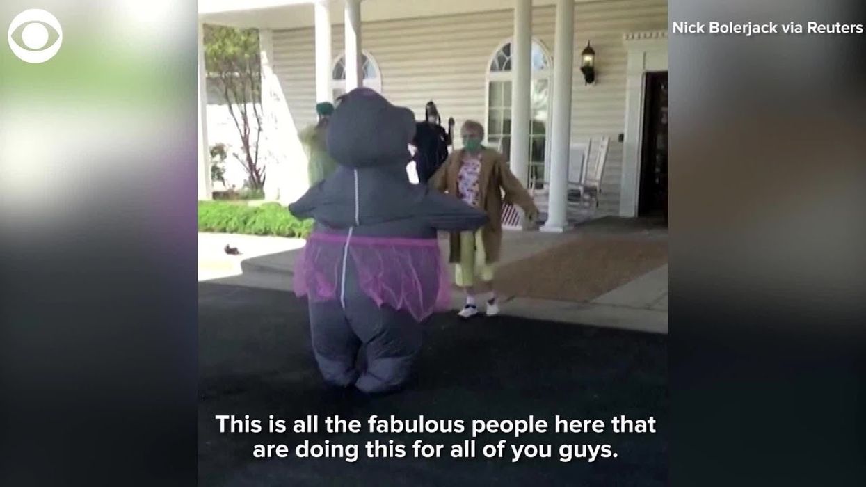 A Virginia woman wore an inflatable hippo in a tutu costume so she could hug her elderly mother
