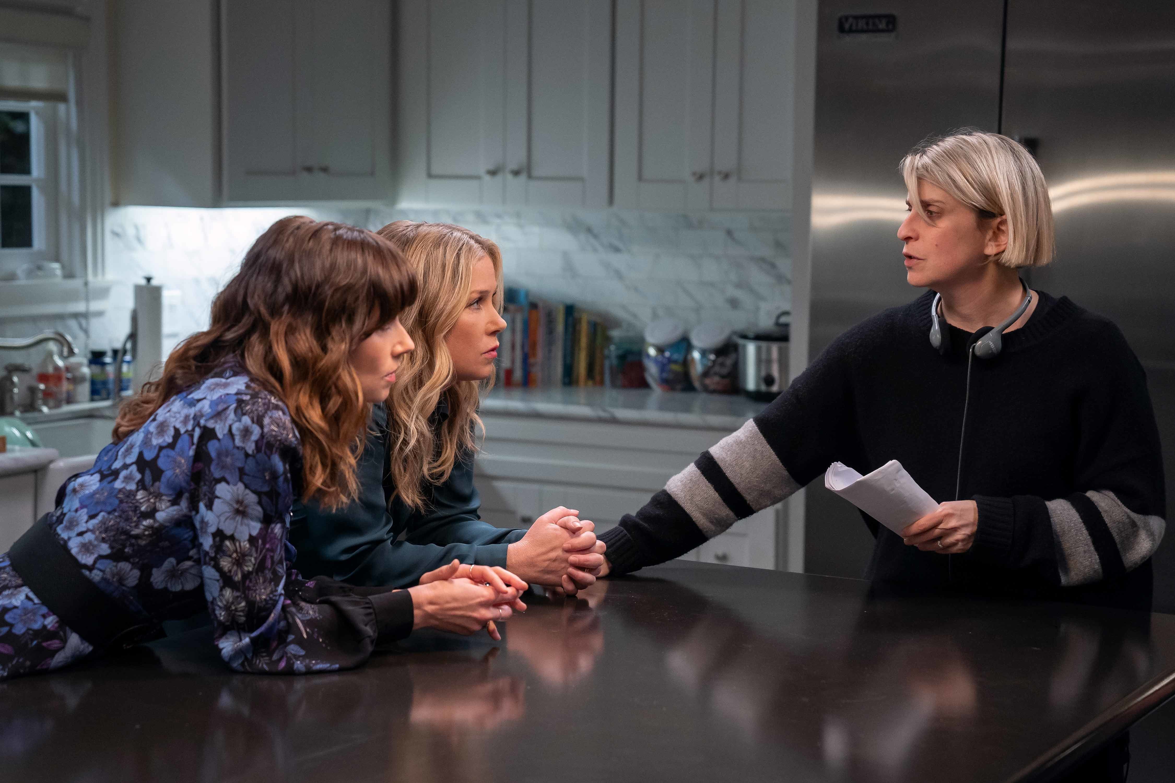 Linda Cardellini abd Christina Applegate on the set of Dead to Me with head writer Liz Feldman.