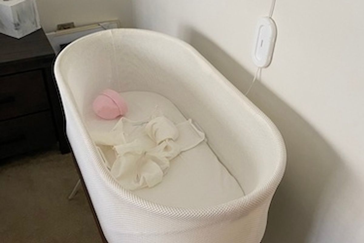 Photo of Snoo Smart Sleeper Bassinet in a bedroom
