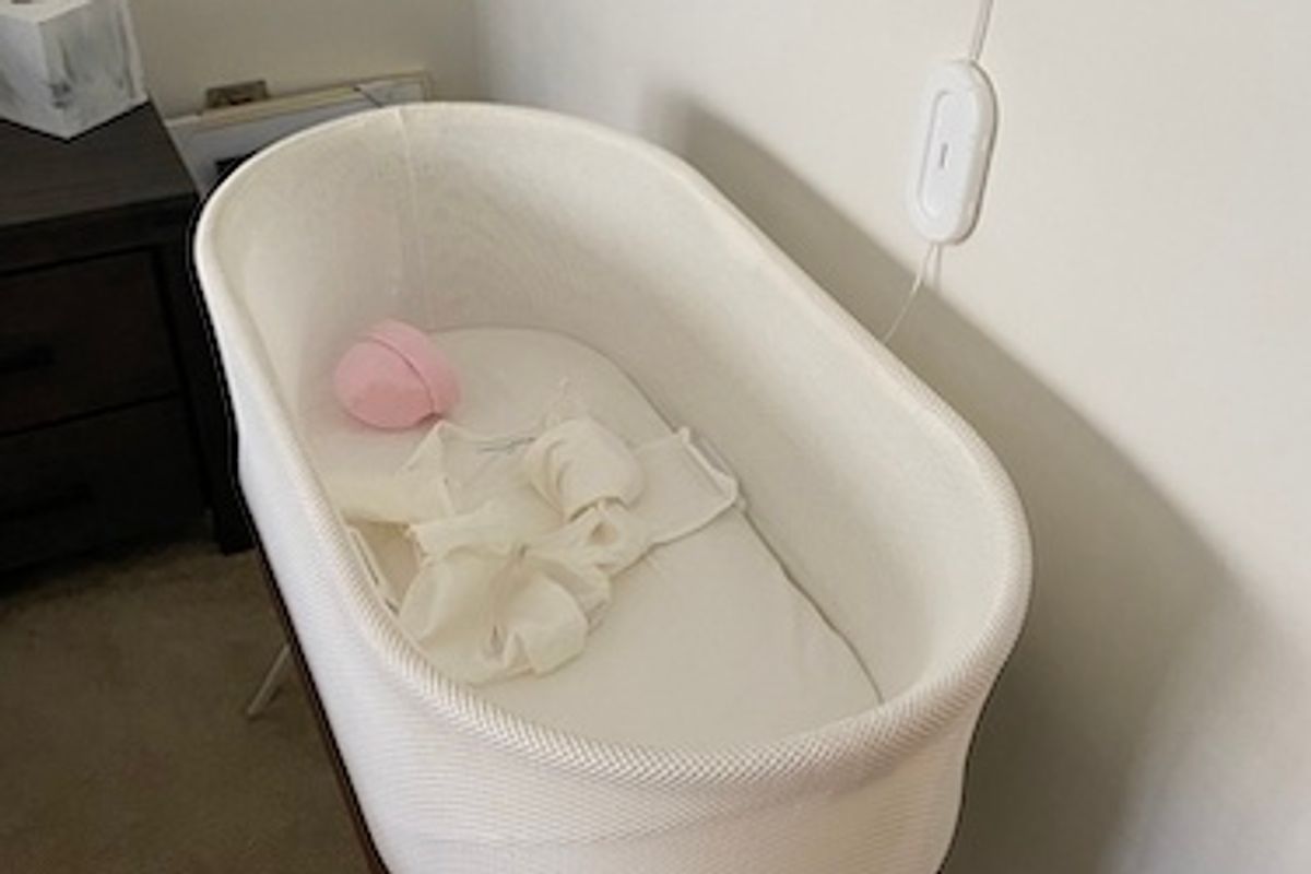 Photo of Snoo Smart Sleeper Bassinet in a bedroom