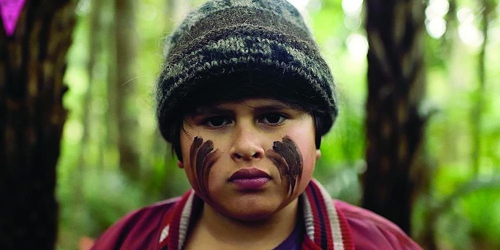 Julian Dennison in the woods in the film Hunt for the Wilderpeople