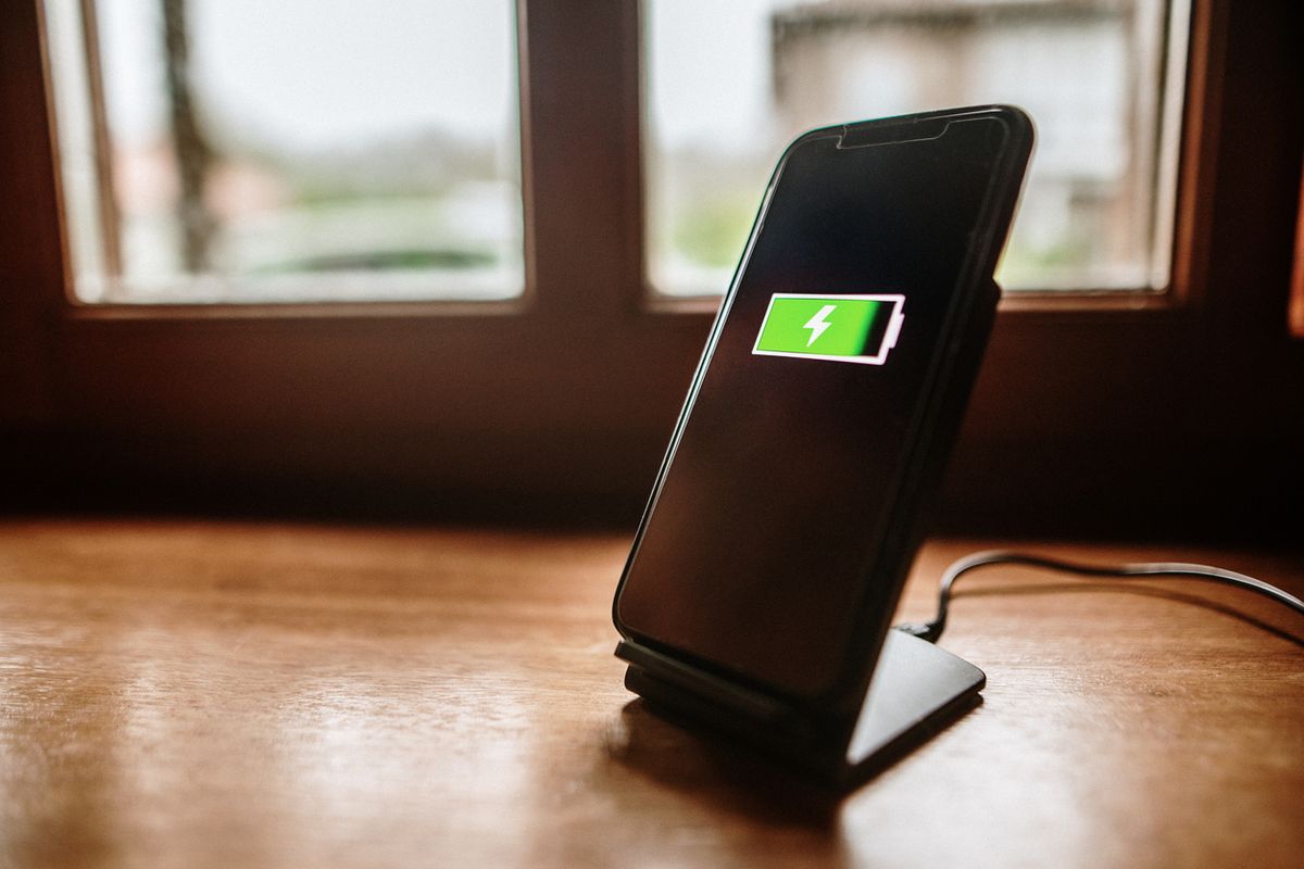 Stock image of a smartphone charging