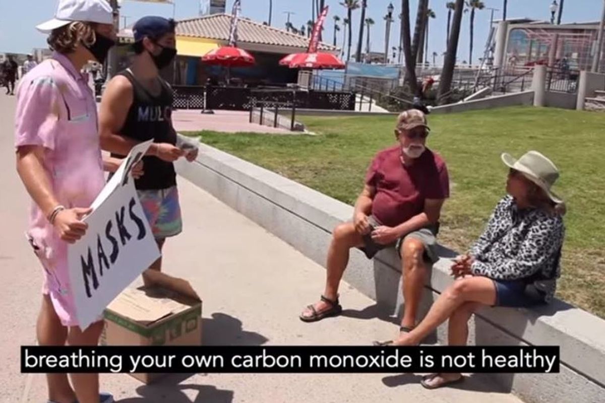 Extremely positive 'bros' tried to help out a California beach town by handing out free masks