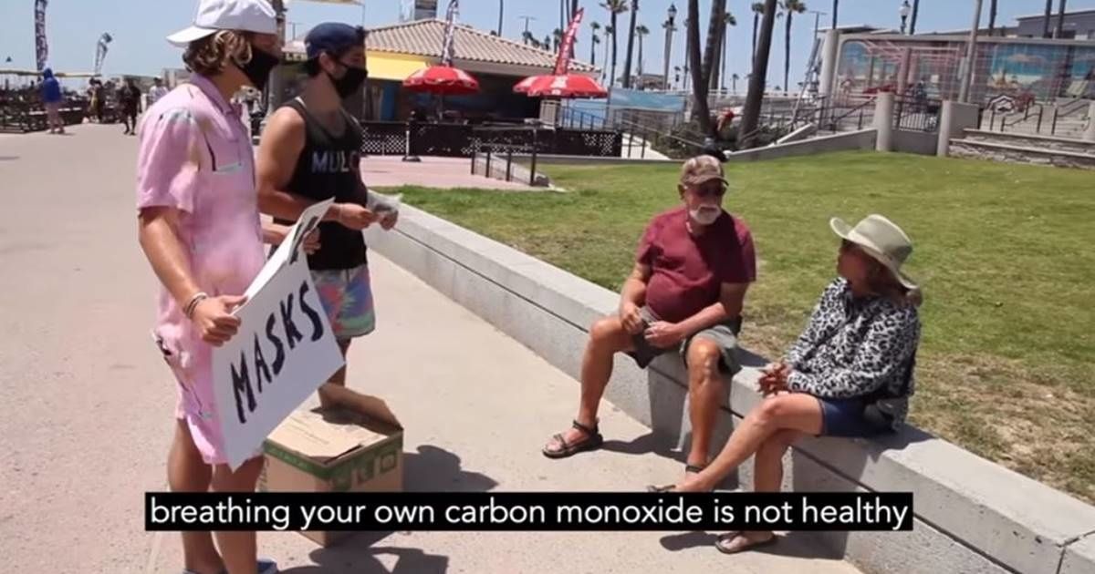 Extremely positive 'bros' tried to help out a California beach town by handing out free masks
