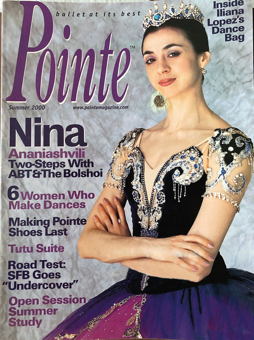 Ananiashvili on the cover of Pointe with her arms crossed in an elaborate tutu and purple font.