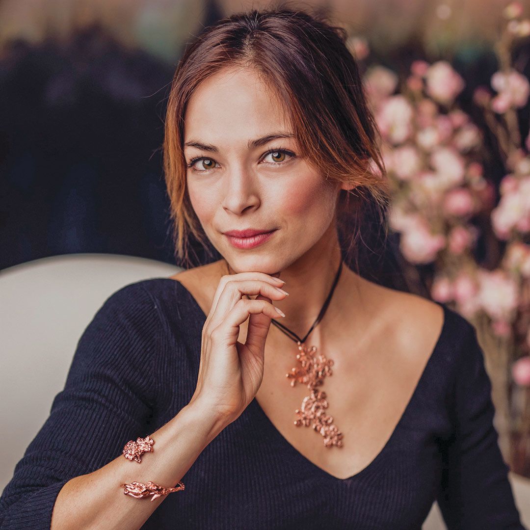 Collage of actress Kristin Kreuk from TV show Burden of Truth and several of her favorite things.
