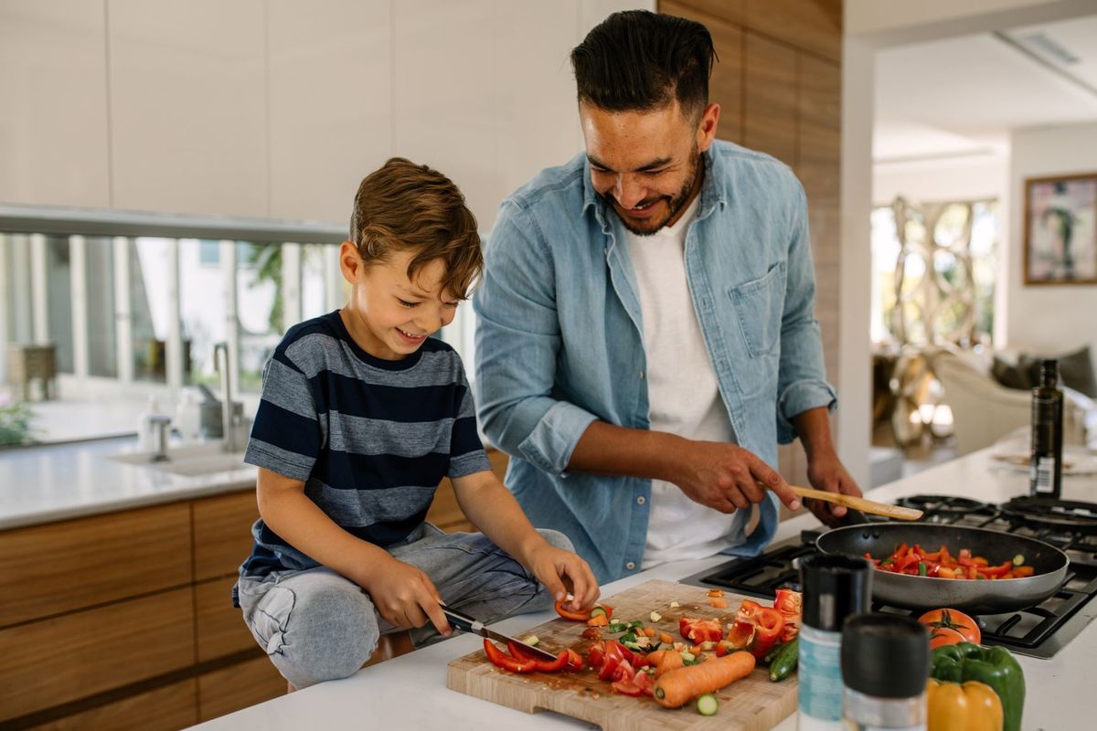 father and son cooking dinner with everyplate mealkit