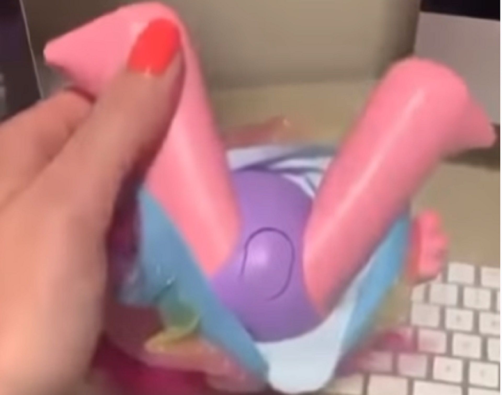 trolls doll with button on private area