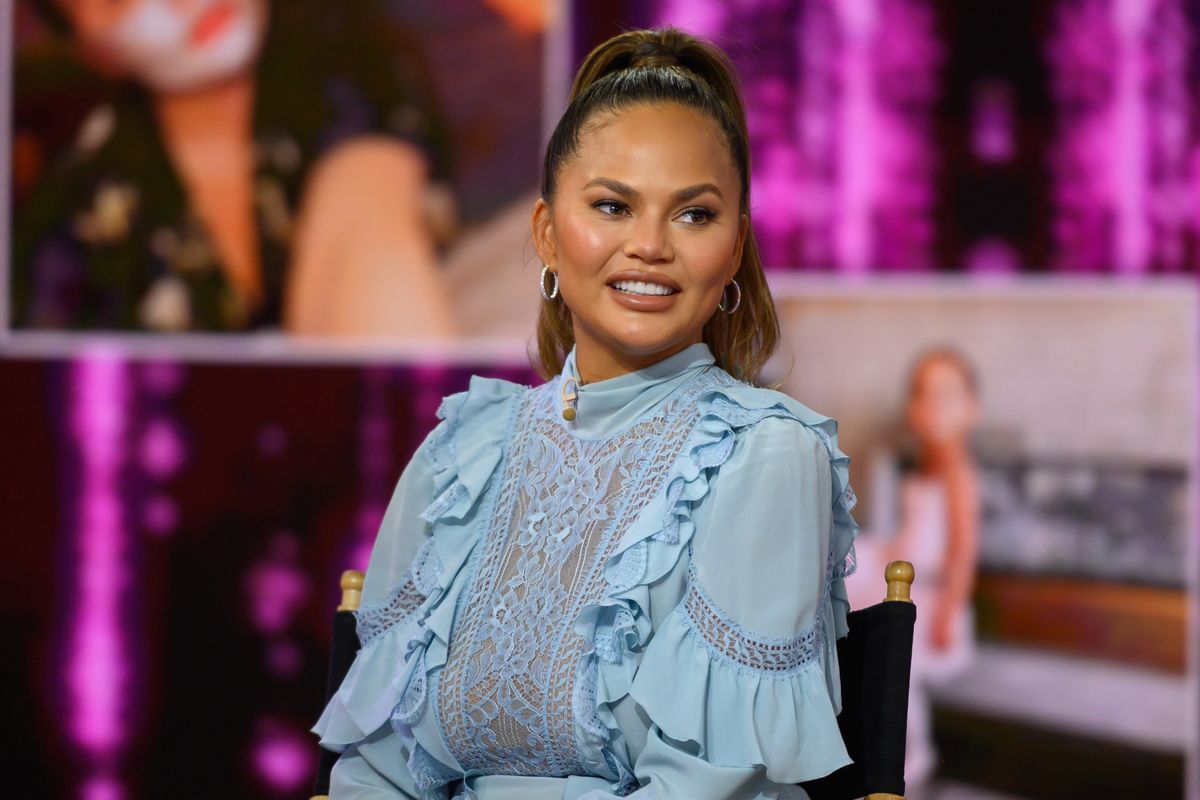 Chrissy Teigen Gets Real About Her Surprise Pregnancy Paper