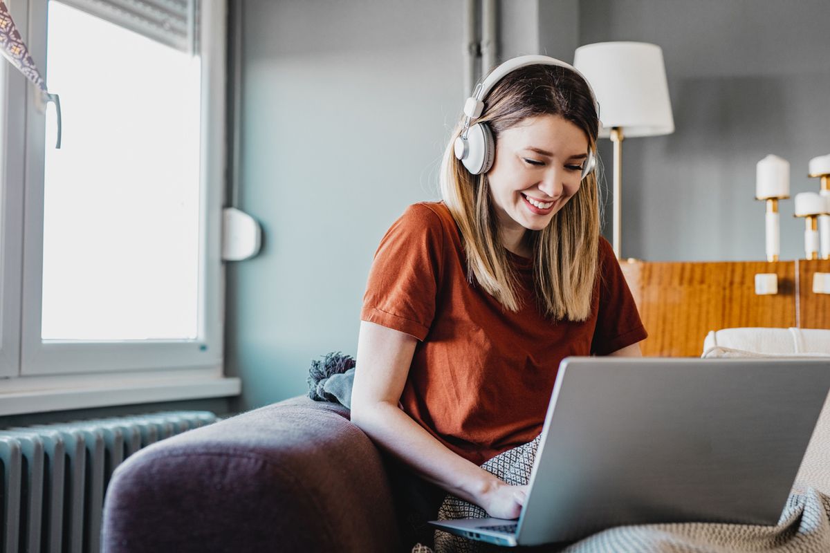 Stock image of a woman listening to music