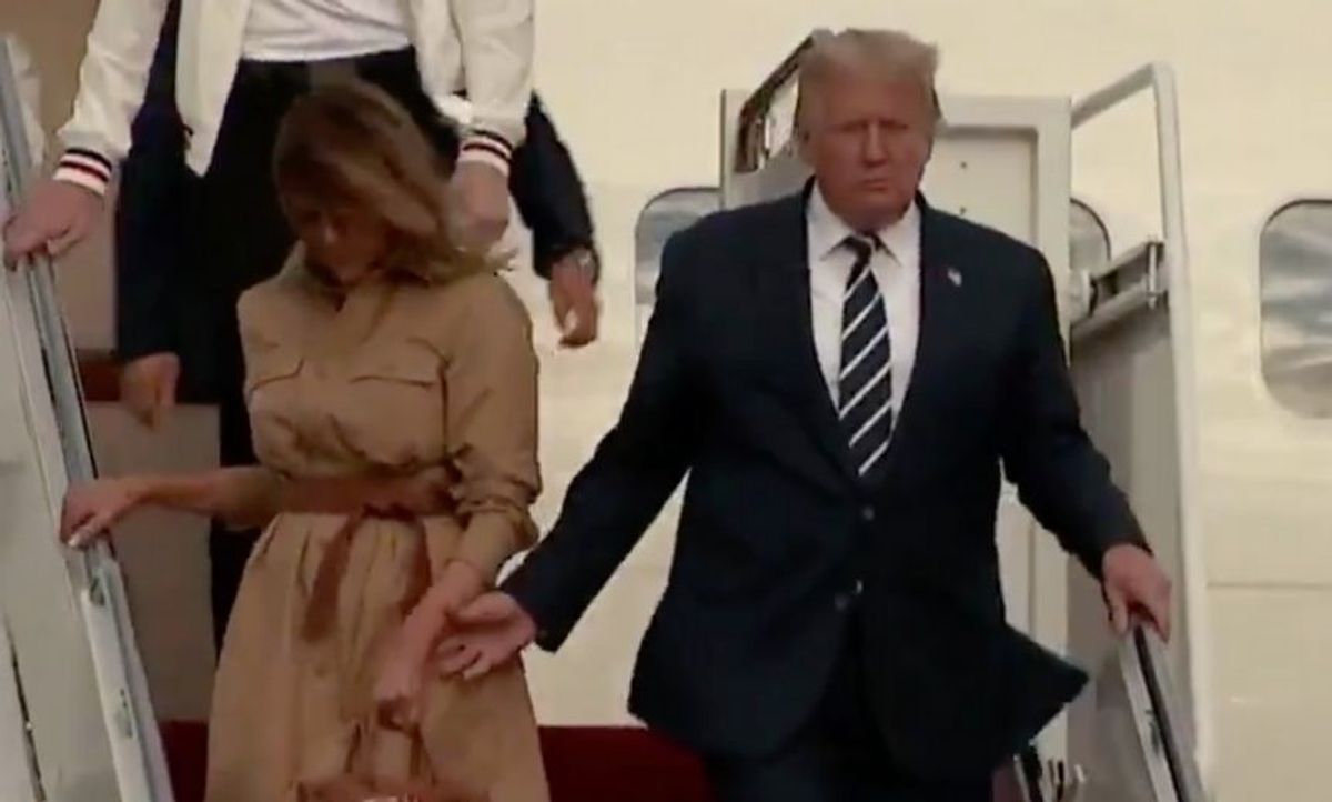 Cringeworthy Video of Trump Trying to Hold Melania's Hand Has People Joking That She'll Vote for Biden