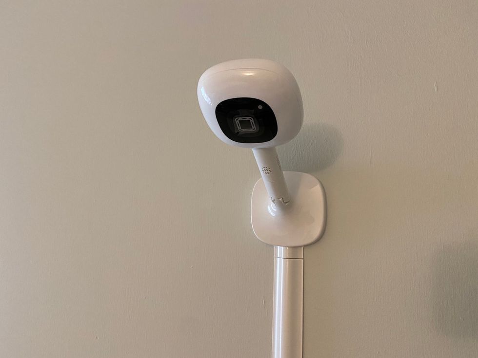 Nanit Plus camera on the wall.