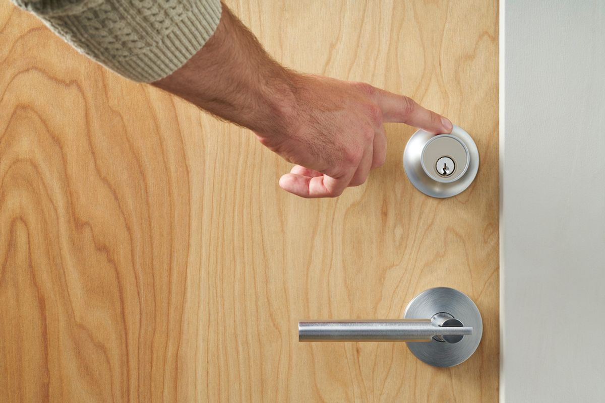 Level Touch Lock being unlocked by person touching lock with finger.